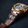 Beaver Crocodile strap from Gunny Straps shown on Patek Phillip Nautilus 5980R a vintage brown handmade watchstrap with custom engraving aquanaut you can request your name on it.