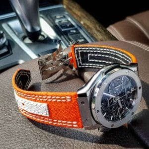 Clementine Canvas by gunny straps an orange canvas with white leather accent on this very sporty strap shown on hublot classic fusion wristwatch