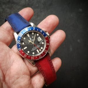 Suede bi color red and blue strap by Gunny Straps official online store shown on rolex pepsi gmt master