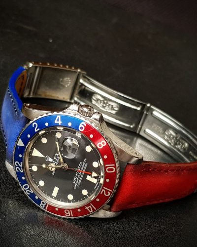 Suede bi color red and blue strap by Gunny Straps official online store shown on rolex pepsi gmt master