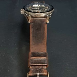 leather strap with minimalist and style and mysterious vintage brown color that created by gunny straps official online store called gurney 4 series shown on omega seamaster speedmaster railmaster rolex