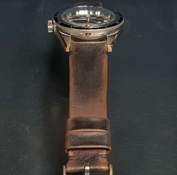 leather strap with minimalist and style and mysterious vintage brown color that created by gunny straps official online store called gurney 4 series shown on omega seamaster speedmaster railmaster rolex