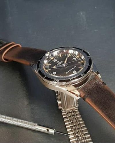 leather strap with minimalist and style and mysterious vintage brown color that created by gunny straps official online store called gurney 4 series shown on omega seamaster speedmaster railmaster rolex