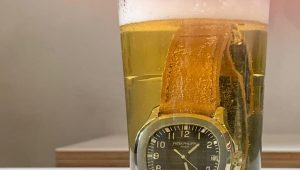Patek Philippe Aquanaut 5167A attached on waterproof strap by Gunny Straps, which ridiculously shown when dipped into beer!