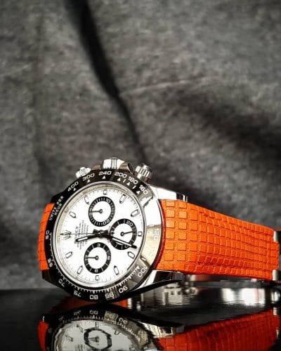 chessboard orange rolex daytona patek aquanaut