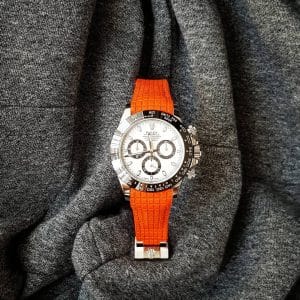 chessboard orange rolex daytona patek aquanaut