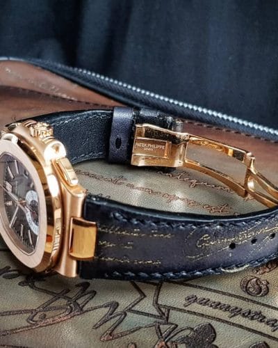 deep black gold scritto patek nautilus aquanaut rolex