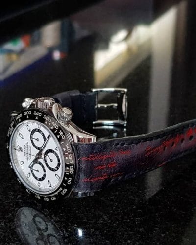 deep black red scritto rolex daytona
