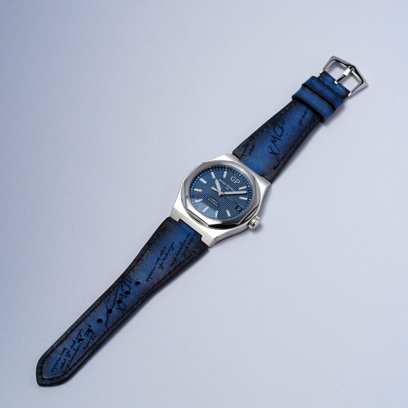 Blue Patina Scritto Strap on Girard Perregaux watch by Gunny Straps
